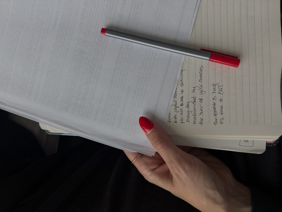 Katherine writing in a journal